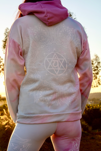 ethereal heart chakra collection of leggings hoodies sport bras.  Colors are light pastels of powder blue and soft pink.  The hood is a medium colored pink.  by goddess swag