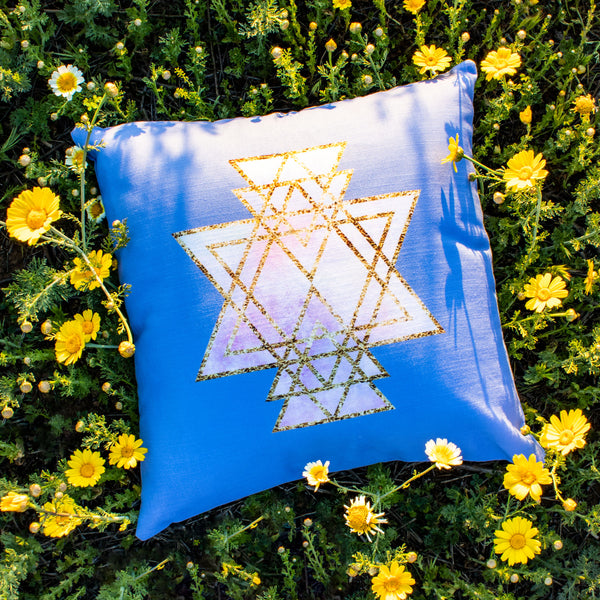 cosmic powers sri yantra throw pillow by goddess swag. blue and yellow colors to shop support and offer prayers to Ukraine