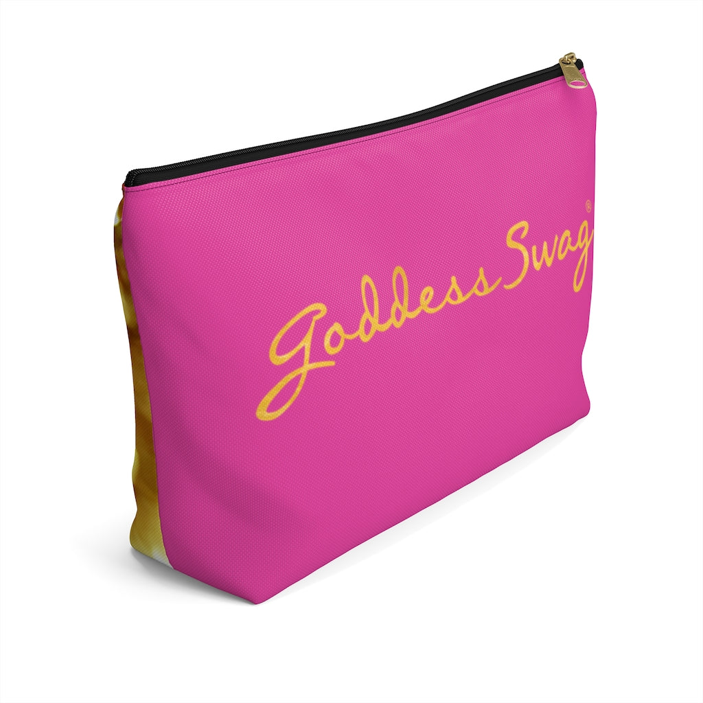 Goddess Swag Bag Mini (named sparkle).  Item can be used as accessory pouch, makeup bag or cosmetic bag. Background is pink on one side with Goddess Swag wording in gold over the pink, and a gold sparkle image on the other side of the bag.  There is an option of a black or a white zipper, and a large or a small bag. 