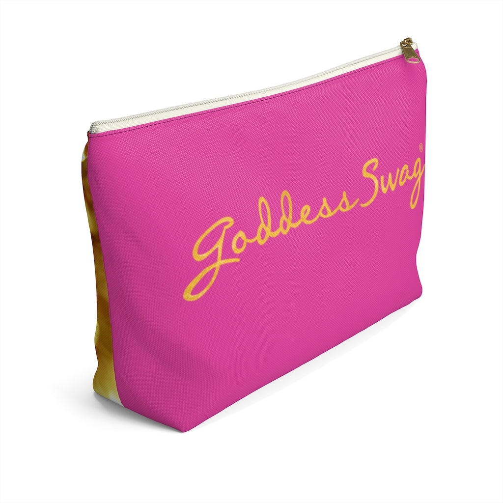 Goddess Swag Bag Mini (named sparkle).  Item can be used as accessory pouch, makeup bag or cosmetic bag. Background is pink on one side with Goddess Swag wording in gold over the pink, and a gold sparkle image on the other side of the bag.  There is an option of a black or a white zipper, and a large or a small bag. 