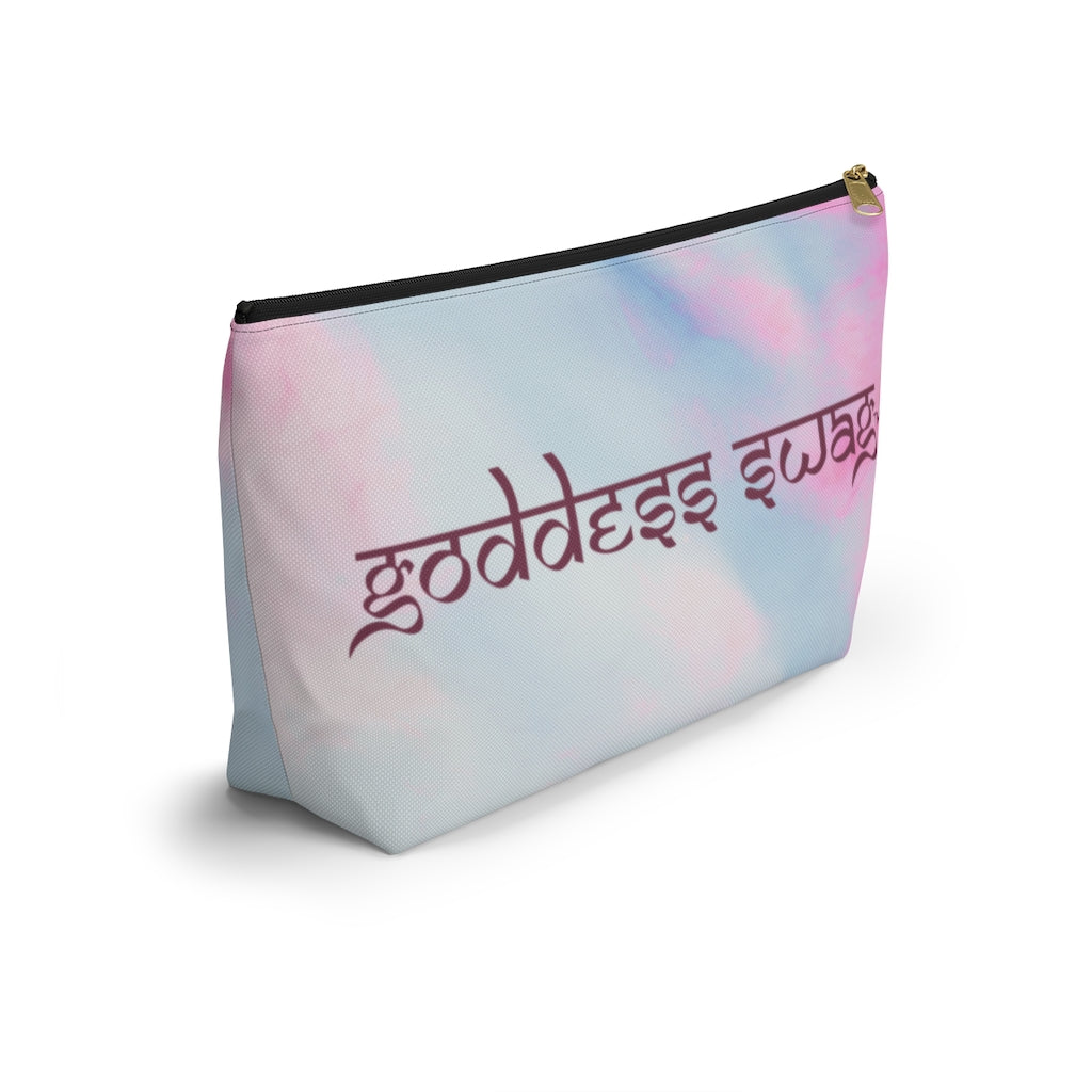Goddess Swag Bag Mini Ethereal Dream Pastel cotton candy colors with goddess swag written sanskrit style in deep purple.  Item can be used as accessory pouch, makeup bag or cosmetic bag. Goddess Swag wording is on one side of the bag only. There is an option of a black or a white zipper, and a large or a small bag.