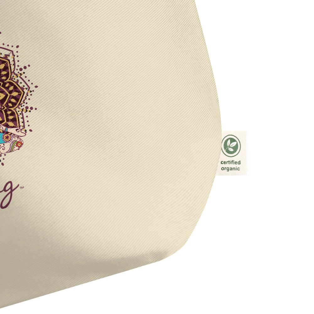  Goddess Swag, Large Eco Tote Bag Organic Cotton Oyster Color with Mandala and Chakra Design by Goddess Swag which is written in deep purple color.