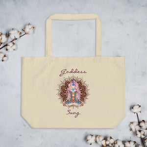  Goddess Swag, Large Eco Tote Bag Organic Cotton Oyster Color with Mandala and Chakra Design by Goddess Swag which is written in deep purple color.