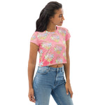 Load image into Gallery viewer, Light to medium pink background with pastel and gold color sri yantra design all over front back and short sleeves.  This is a crop top tee by goddess swag as part of the cosmic powers collection
