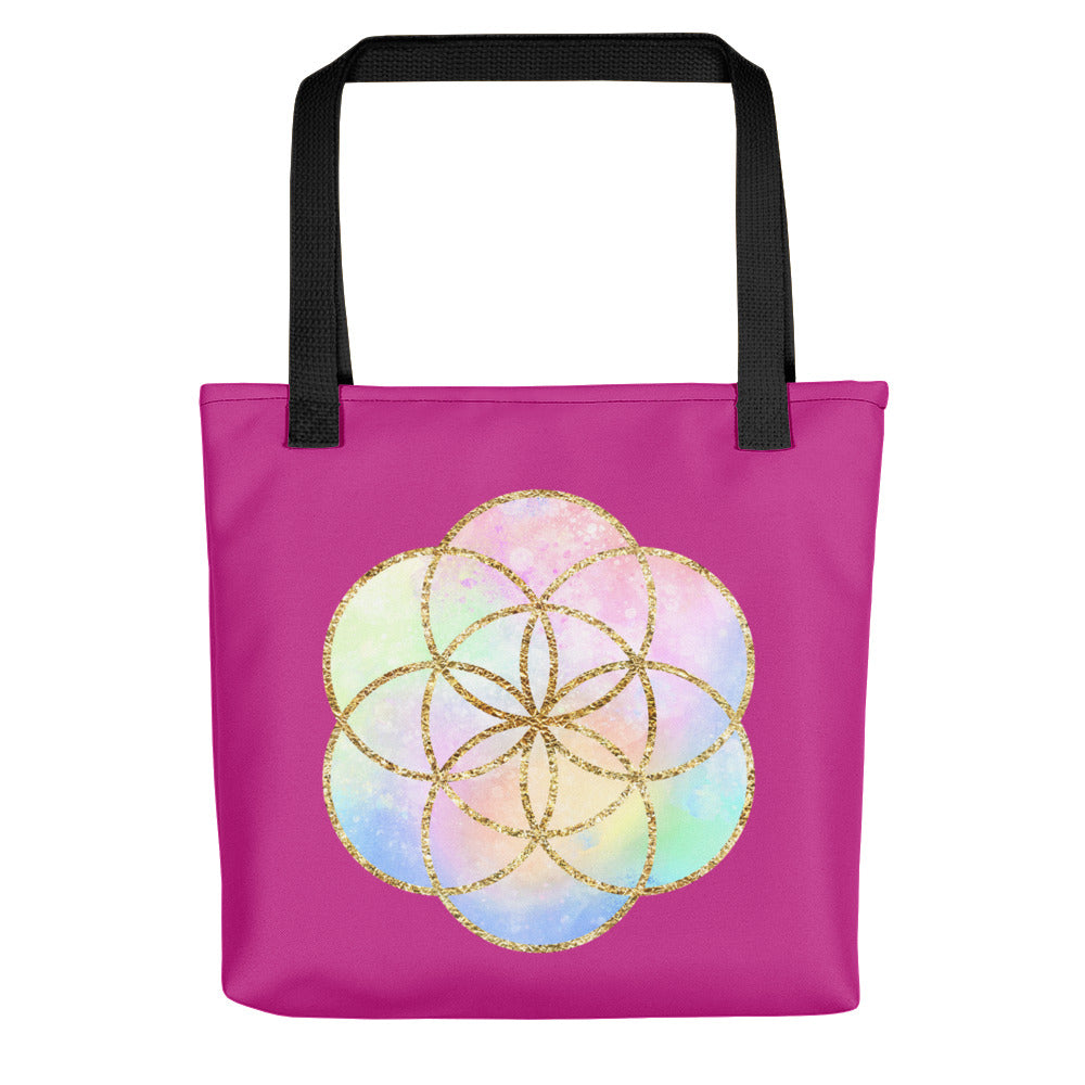 cosmic powers tote shopping bag by goddess swag,  with beautiful seed of life design in pastels and gold. background color is a deep pink and the handle is black.