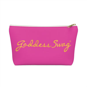 Goddess Swag Bag Mini (named sparkle).  Item can be used as accessory pouch, makeup bag or cosmetic bag. Background is pink on one side with Goddess Swag wording in gold over the pink, and a gold sparkle image on the other side of the bag.  There is an option of a black or a white zipper, and a large or a small bag. 