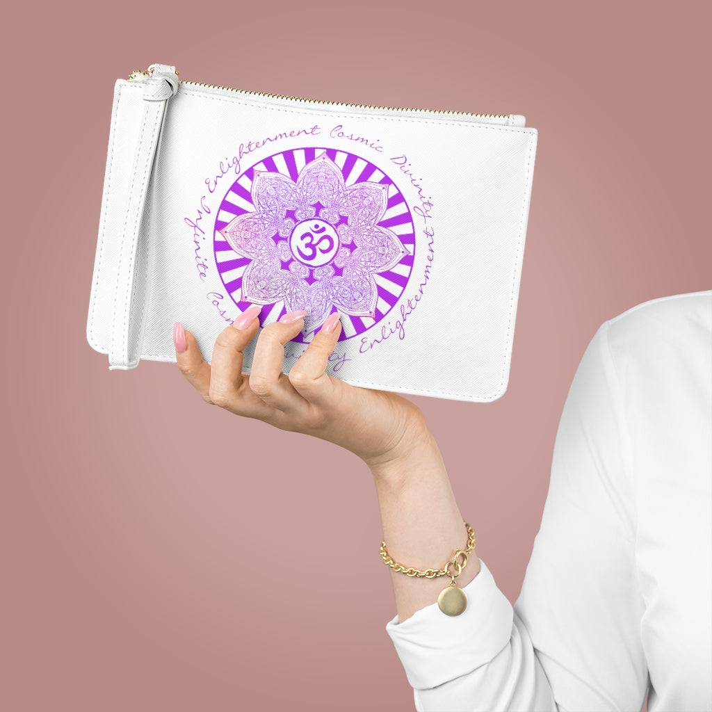 white vegan leather small pouch clutch with wrist handle. Design on one side is a violet crown chakra mandala pattern with the om symbol in the center and on the outside in a circle pattern are the words cosmic enlightenment and divinity.  On the other side is goddess swag in gold writing