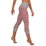 Load image into Gallery viewer, Yoga capri leggings midcalf length by Goddess Swag.  Background solid color is a medium grey. design overlay in front and back is a red mandala print for the earth star chakra.  On front waist is the earth star chakra centered. On back waist is goddess swag written out in red.
