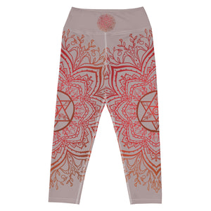 Yoga capri leggings midcalf length by Goddess Swag.  Background solid color is a medium grey. design overlay in front and back is a red mandala print for the earth star chakra.  On front waist is the earth star chakra centered. On back waist is goddess swag written out in red.
