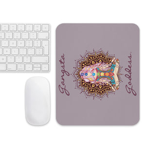 Mouse pad with Gangsta Goddess written in a deep purple and a design image of a goddess sitting in lotus yoga position with a mandala behind her and all 7 chakra colors from root to crown.  The background is a mauve gray solid color.  Size: 8.7″ × 7.1″ × 0.12″ 