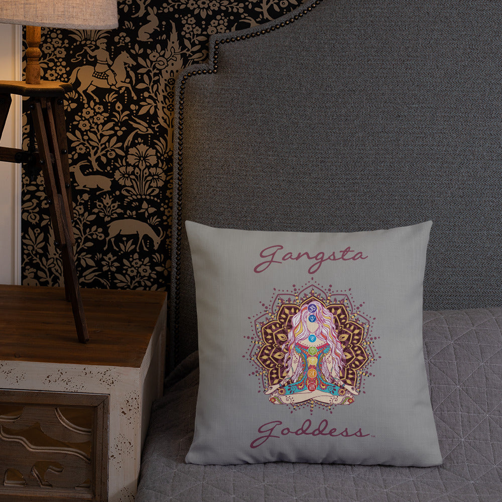 gangsta goddess 18x18 throw pillow by goddess swag. double sided with blue color background. Image is a design of a goddess in yoga lotus position, mandala behind her, 7 chakras up her center. Gangsta is written above image and goddess is written below image.