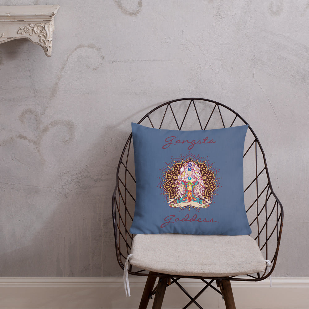gangsta goddess 18x18 throw pillow by goddess swag. double sided with blue color background. Image is a design of a goddess in yoga lotus position, mandala behind her, 7 chakras up her center. Gangsta is written above image and goddess is written below image.