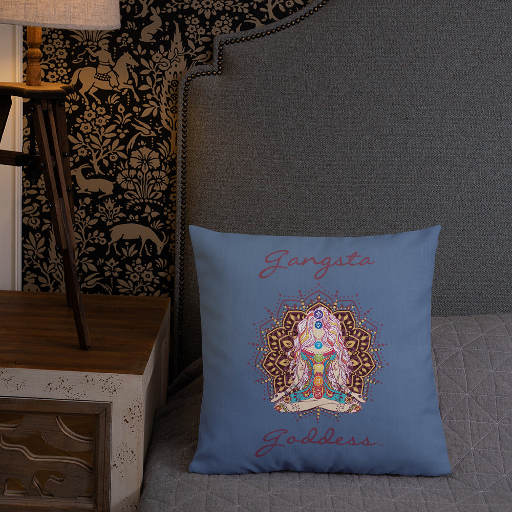 gangsta goddess 18x18 throw pillow by goddess swag. double sided with blue color background. Image is a design of a goddess in yoga lotus position, mandala behind her, 7 chakras up her center. Gangsta is written above image and goddess is written below image.