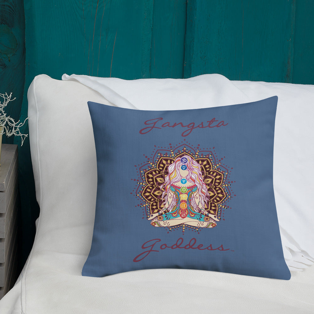 gangsta goddess 18x18 throw pillow by goddess swag. double sided with blue color background. Image is a design of a goddess in yoga lotus position, mandala behind her, 7 chakras up her center. Gangsta is written above image and goddess is written below image.