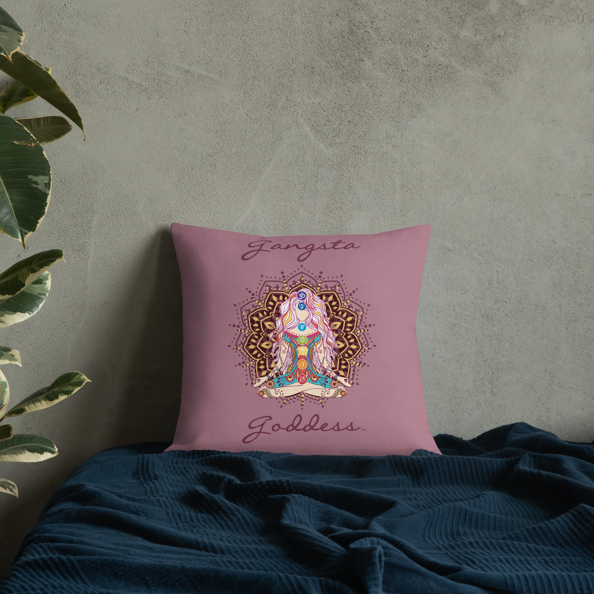 gangsta goddess 18x18 throw pillow by goddess swag.  double sided with rose color background. Image is a design of a goddess in yoga lotus position, mandala behind her, 7 chakras up her center. Gangsta is written above image and goddess is written below image. 