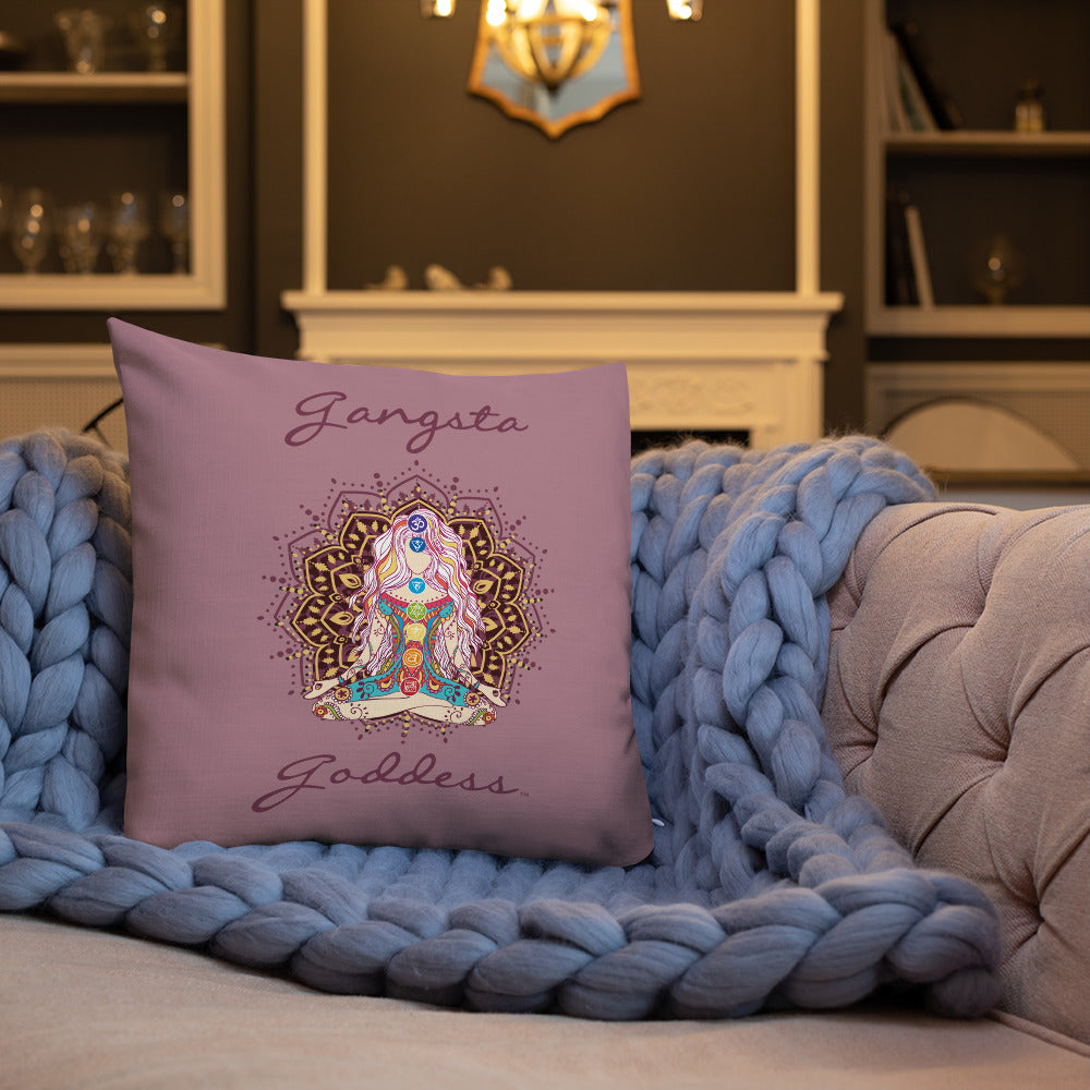gangsta goddess 18x18 throw pillow by goddess swag.  double sided with rose color background. Image is a design of a goddess in yoga lotus position, mandala behind her, 7 chakras up her center. Gangsta is written above image and goddess is written below image. 