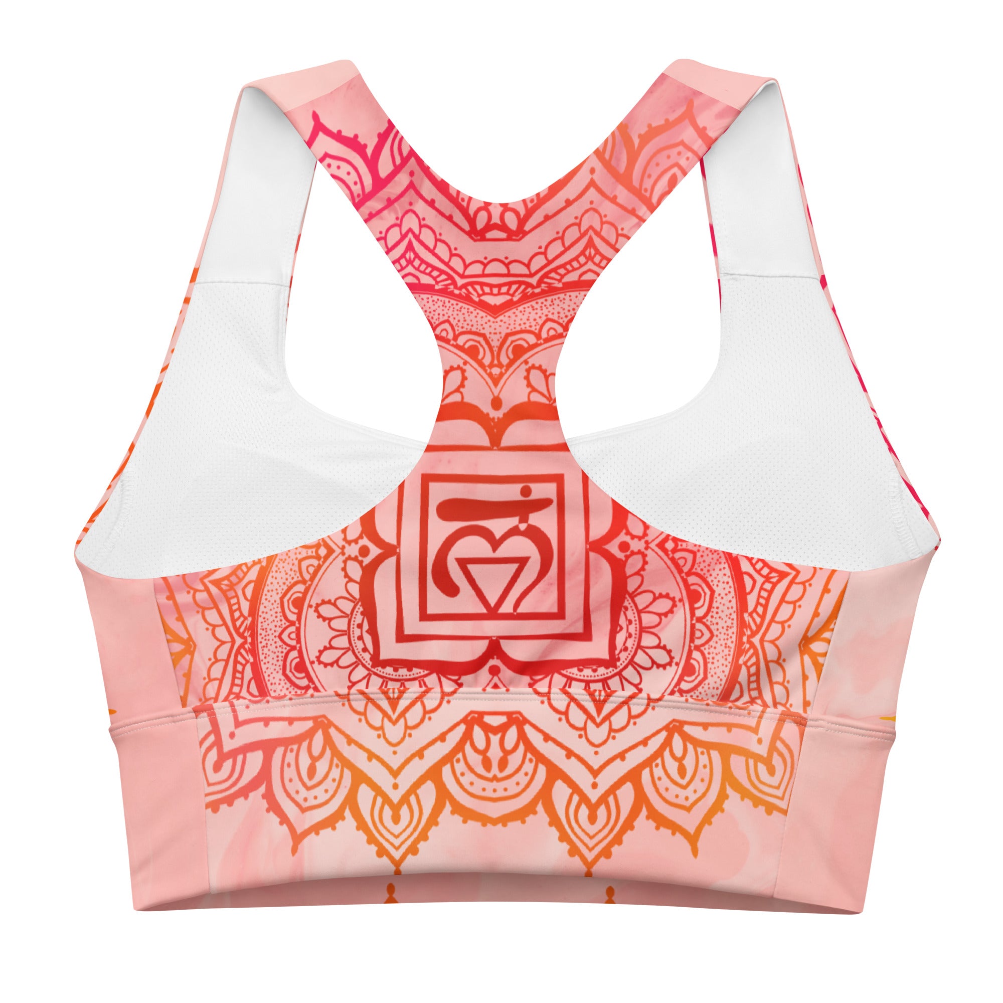 longline sports bra by goddess swag. the design has a pink orange background with an overlay of a root chakra mandala design in red and orange. this design is on front and back of sports bra.