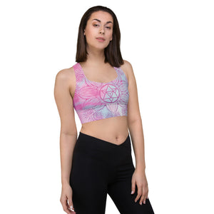 longline sports bra by goddess swag.  colors are pastel pinks and blues. the design on front and back is a magenta pink mandala and star tetrahedron to represent the soul star chakra