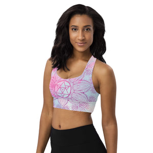 longline sports bra by goddess swag.  colors are pastel pinks and blues. the design on front and back is a magenta pink mandala and star tetrahedron to represent the soul star chakra