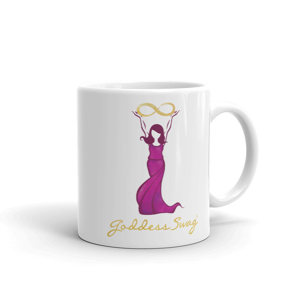 Goddess Swag Signature Logo Ceramic Coffee Mug 11oz with goddess holding  a gold infinity design above her head.  Her dress is magenta.  Goddess Swag is written in gold. 11 ounces