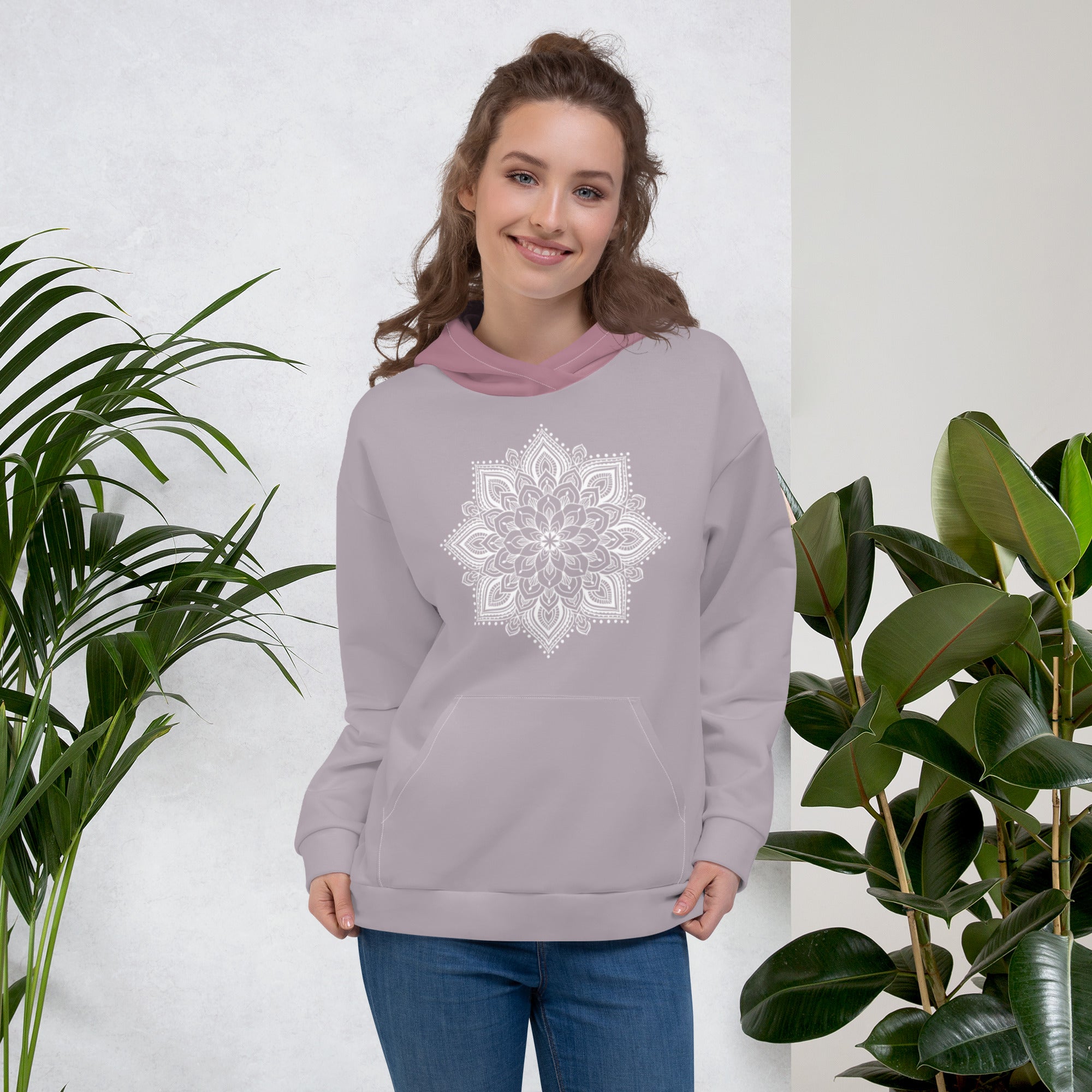 mystic 77 heart chakra mandala hoodie by goddess swag.  design on front is a white mandala.  design on back is a white heart chakra mandala enlarged. The hood is a medium mauve. The background of the hoodie is a solid light mauve.  Hoodie has a pocket pouch in front.