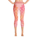 Load image into Gallery viewer, capri mid calf leggings. design is root chakra mandala of orange and red on legs front and back.  the front waistband has the root chakra symbol in the center while the back has goddess swag written on the waist band.
