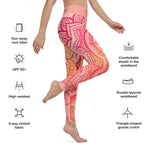 Load image into Gallery viewer, Full length leggings. Coloring is light pink, orange and red for the root chakra, front and back.  the waist band has the root chakra mandala design.  the back waist band has goddess swag written in sanskrit style font. Designed by goddess swag.
