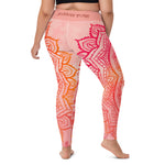 Load image into Gallery viewer, Full length leggings. Coloring is light pink, orange and red for the root chakra, front and back.  the waist band has the root chakra mandala design.  the back waist band has goddess swag written in sanskrit style font. Designed by goddess swag.

