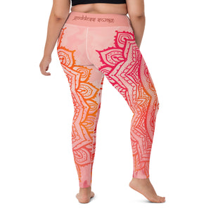Full length leggings. Coloring is light pink, orange and red for the root chakra, front and back.  the waist band has the root chakra mandala design.  the back waist band has goddess swag written in sanskrit style font. Designed by goddess swag.