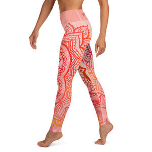 Full length leggings. Coloring is light pink, orange and red for the root chakra, front and back.  the waist band has the root chakra mandala design.  the back waist band has goddess swag written in sanskrit style font. Designed by goddess swag.