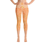 Load image into Gallery viewer, yoga capri leggings by goddess swag. Design is a sacral chakra mandala on front and back of leggings in deep orange and light yellow coloring.  Back waist has goddess swag written in light gold. mid calf legging length.
