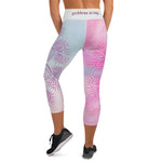 Load image into Gallery viewer, capri length yoga leggings soft pastel blue and pink background with soul star chakra mandala design overlay in deep pink.  Goddess Swag written on back waist.
