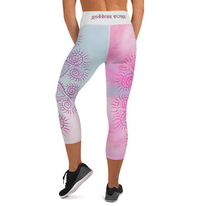 capri length yoga leggings soft pastel blue and pink background with soul star chakra mandala design overlay in deep pink.  Goddess Swag written on back waist.