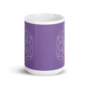 Amethyst third eye chakra ceramic coffee mug design is a light purple background with sacred geometry and all seven chakras.  coffee mug is 15 ounces. By goddess swag