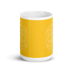 Load image into Gallery viewer, citrine solar plexus chakra ceramic coffee mug design is a yellow background with sacred geometry and all seven chakras.  coffee mug is 15 ounces. By goddess swag
