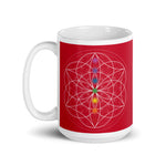 Load image into Gallery viewer, Ruby Root chakra ceramic coffee mug design is a red background with sacred geometry  and all seven chakras.  coffee mug is 15 ounces. By goddess swag
